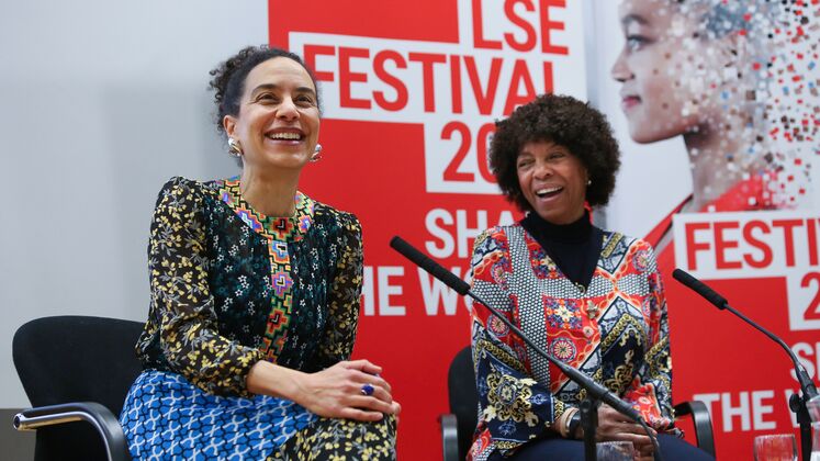 African Women Writers event speakers in front of LSE Festival branding