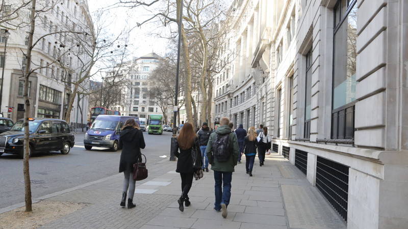 aldwych london students walking away