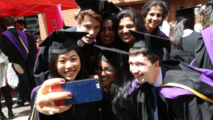 Students taking a selfie at LSE graduation Day