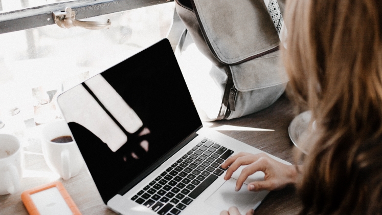 A girl using a laptop