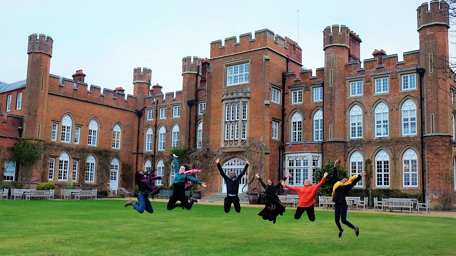 Victor and his friends photographed mid-jump in front of Windsor castle