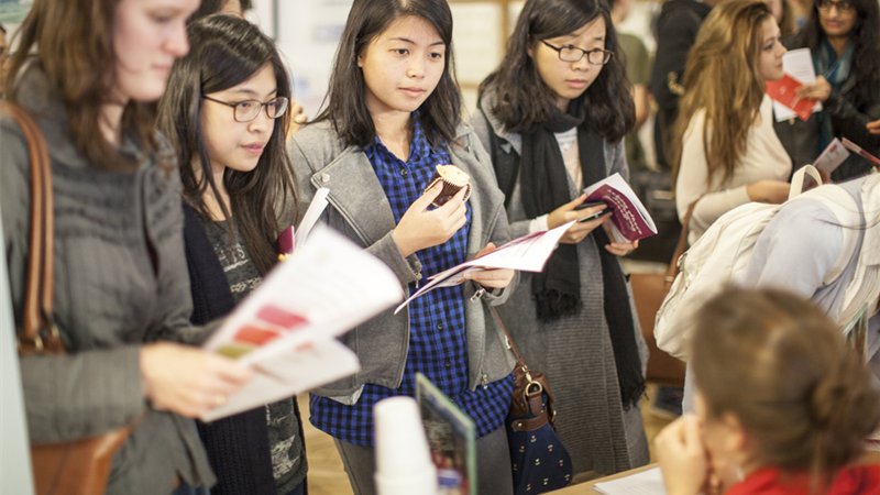 Employer talking to students