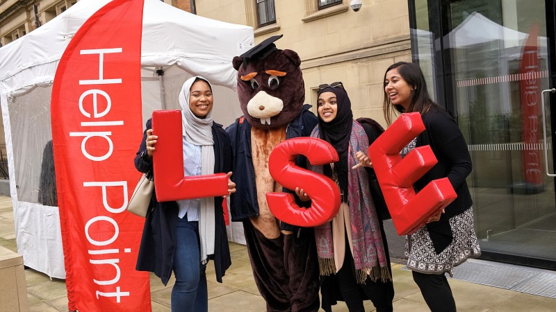 students at the LSE help point during Welcome Week