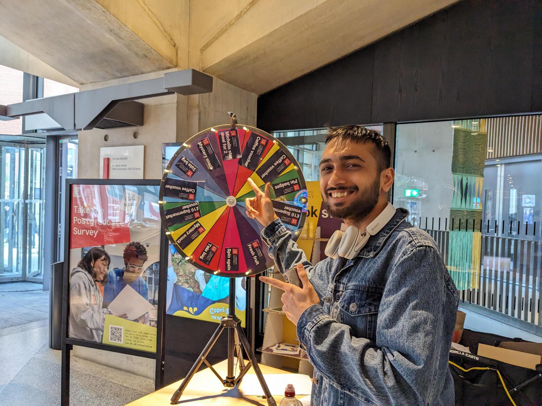 A postgraduate student at the spin the wheel event