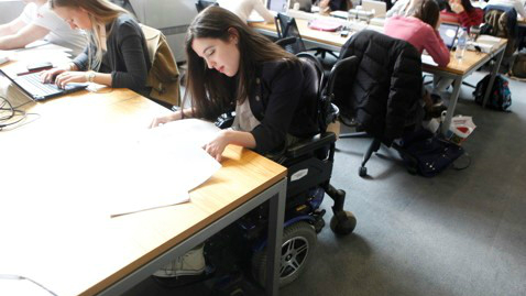 A student studying in the LSE Library