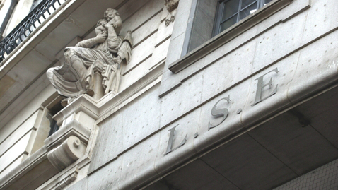 The letters 'LSE' on the side of a building