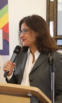 Minouche Shafik speaking at Spectrum anniversary event