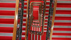 A staircase carpeted in red