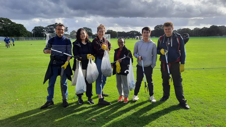 Team photo from litter pick event at the LSE Sportsground in 2021